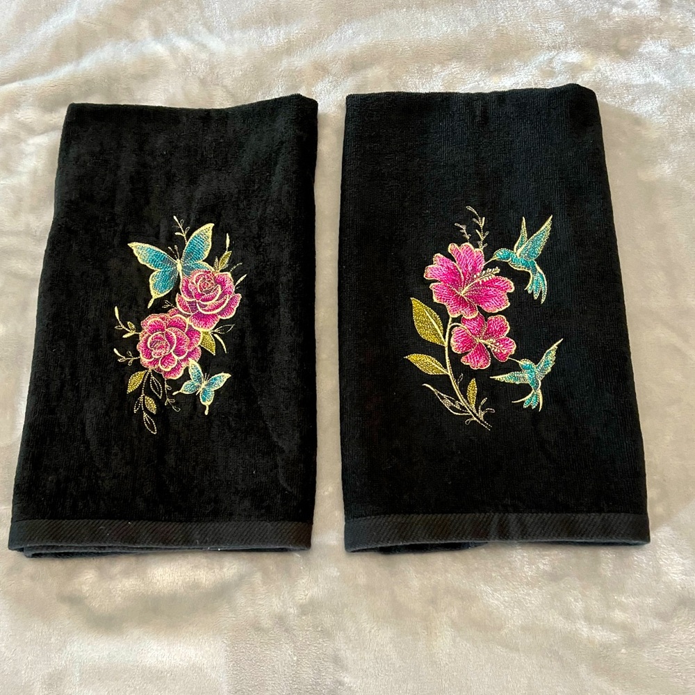 Handcrafted floral hummingbird/butterfly theme embroidered pair of hand towels.